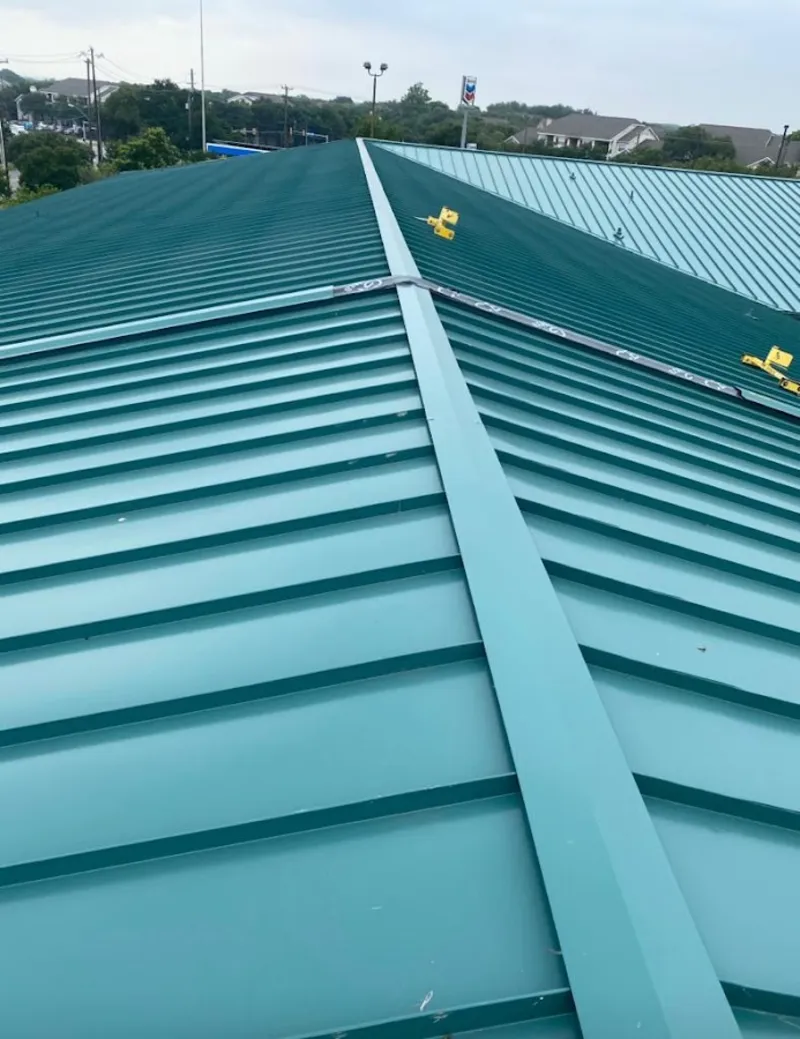 Green commercial metal roof ridge and valley for Metal Roof Repair in Le Roy